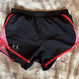 Black and red Under Armor women’s shorts.